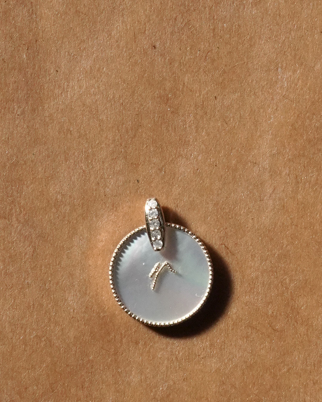 shell coin letter r