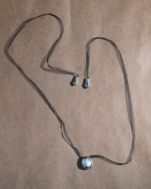 A stone locket necklace ribon BK