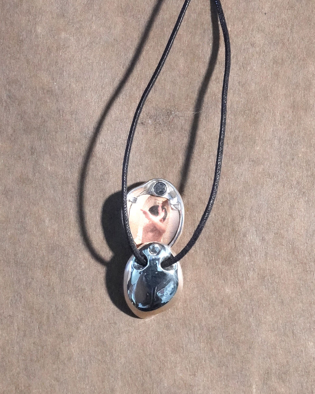 A stone locket necklace rope