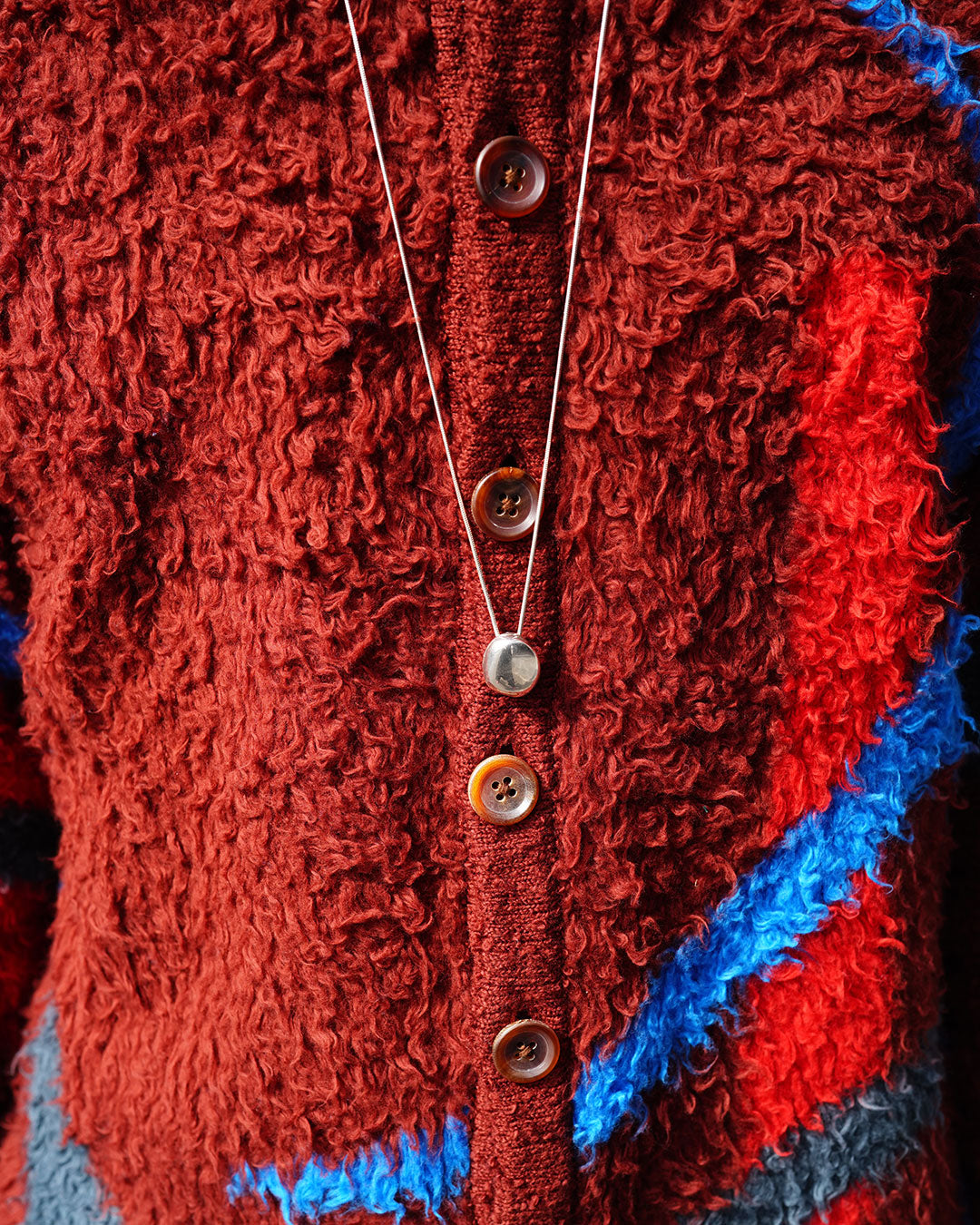 A stone locket necklace