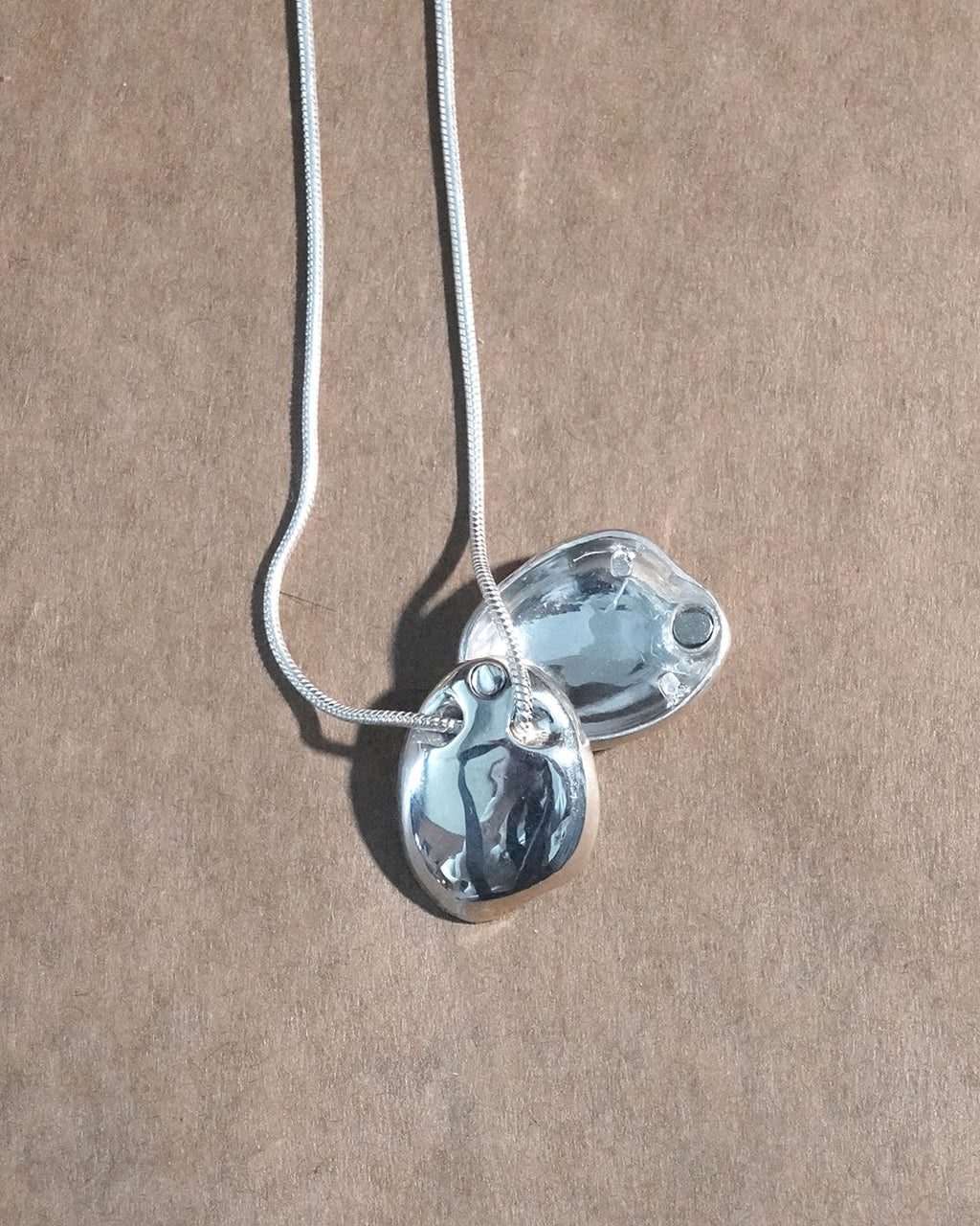 A stone locket necklace