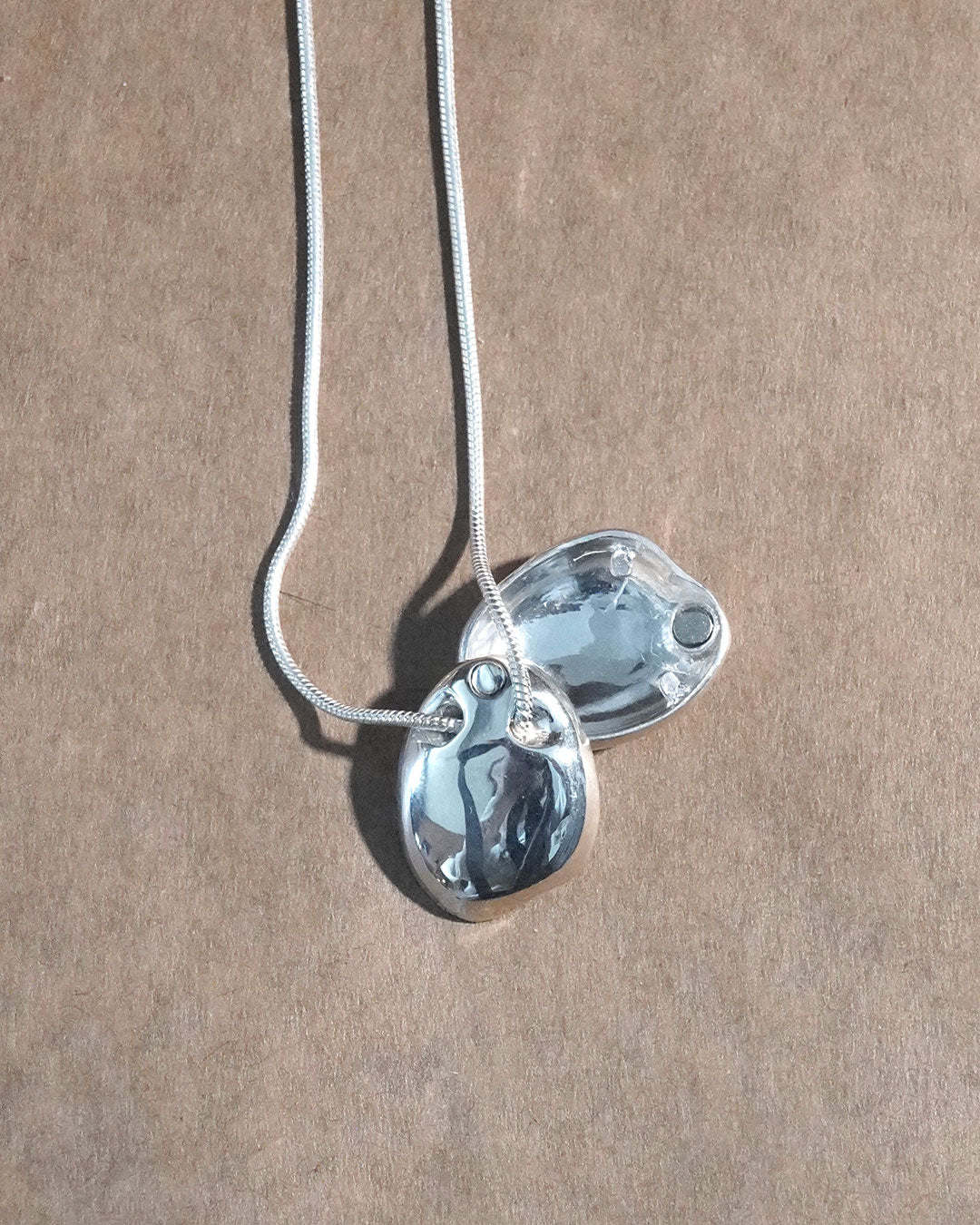A stone locket necklace