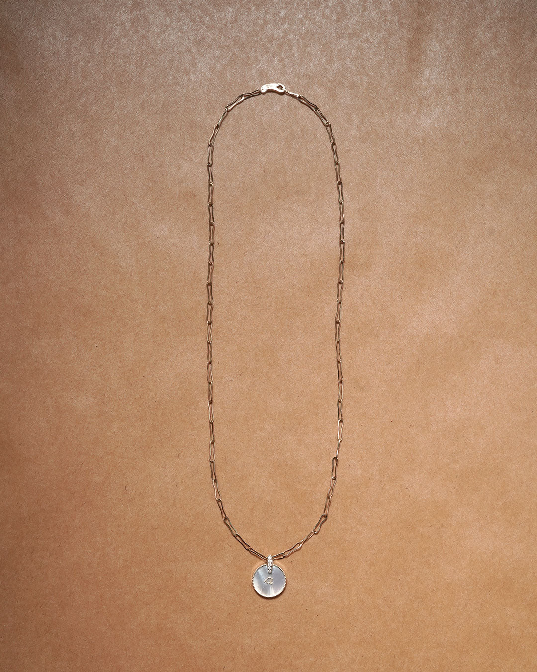 shell coin letter a necklace styling