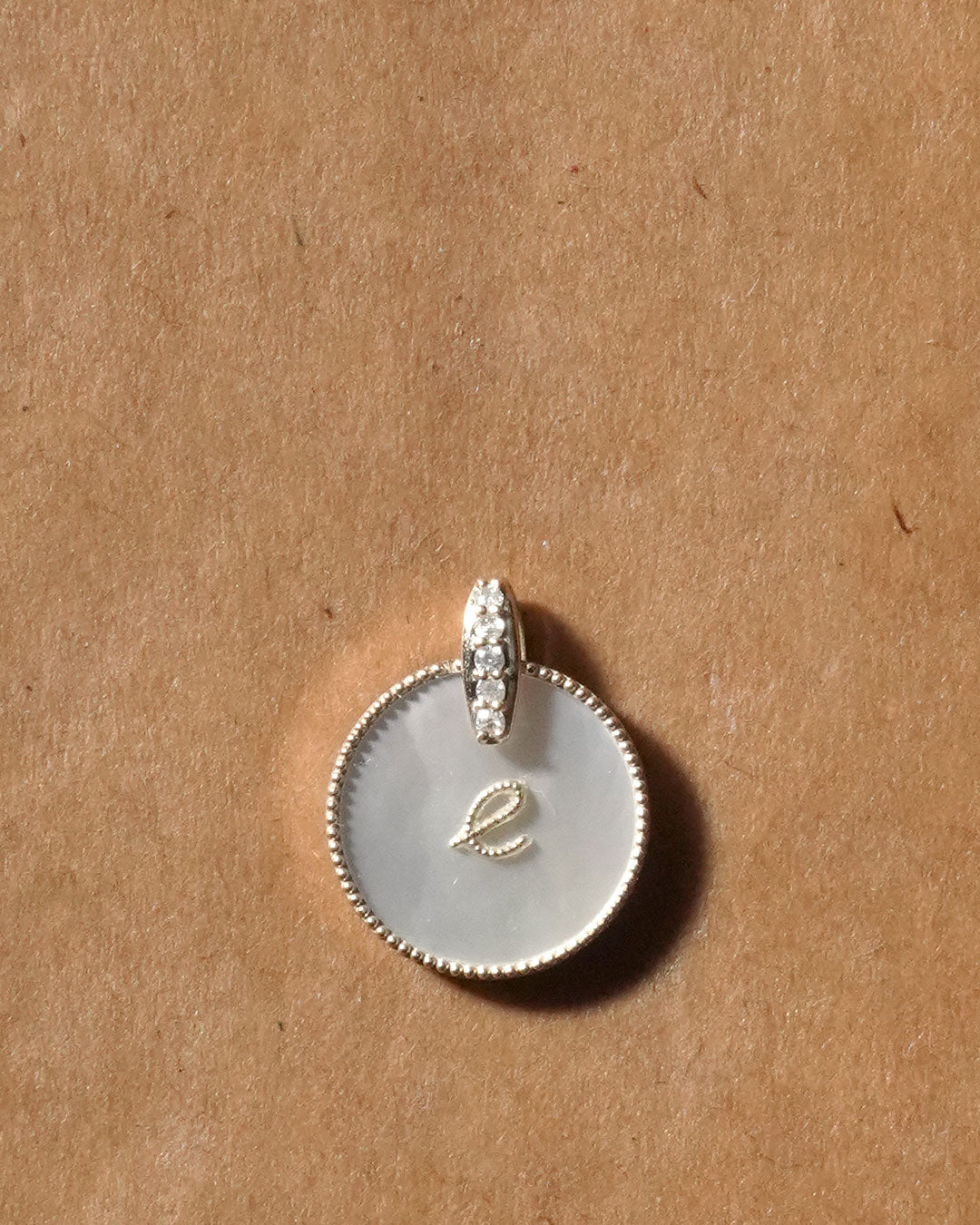 shell coin letter e