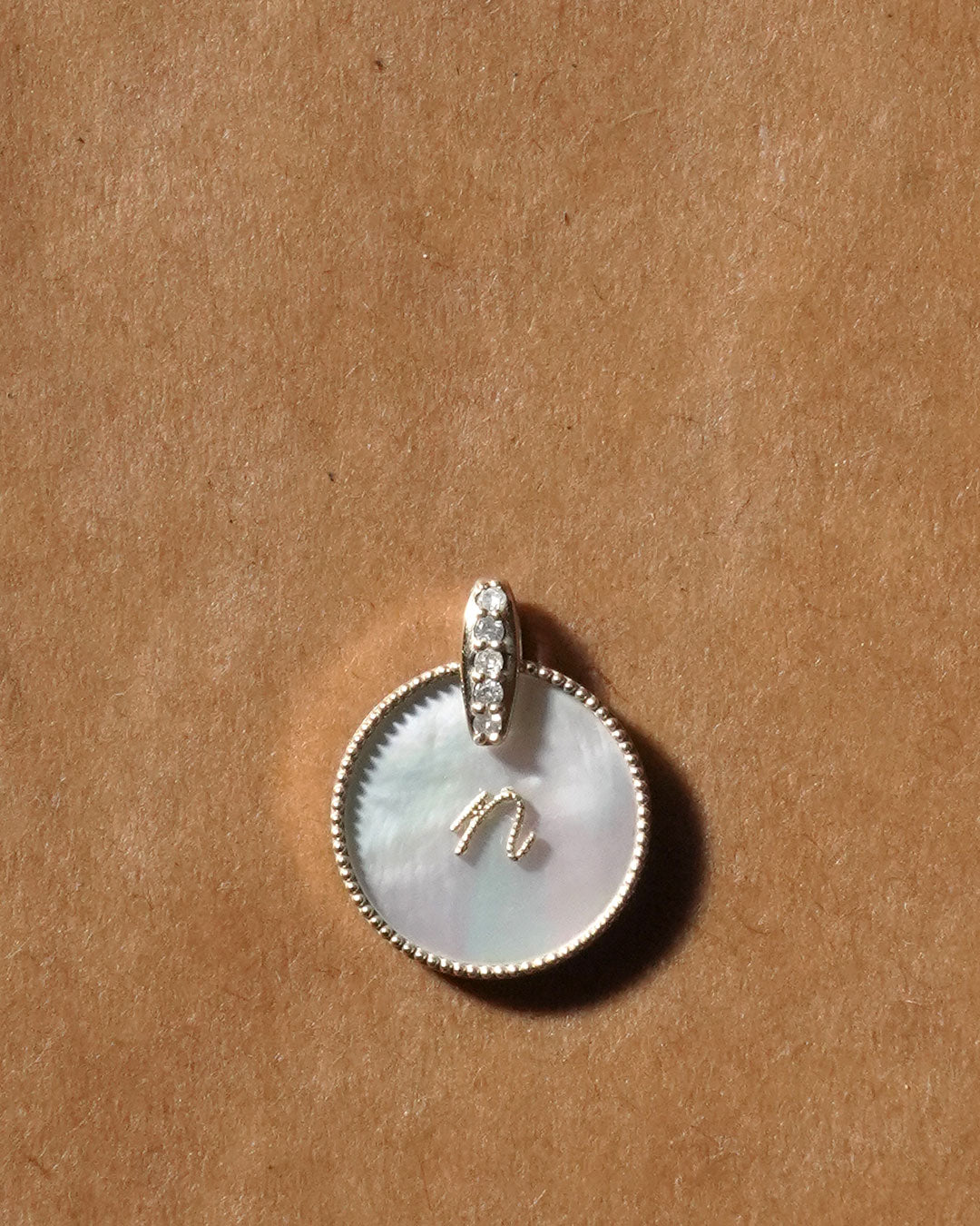 shell coin letter n