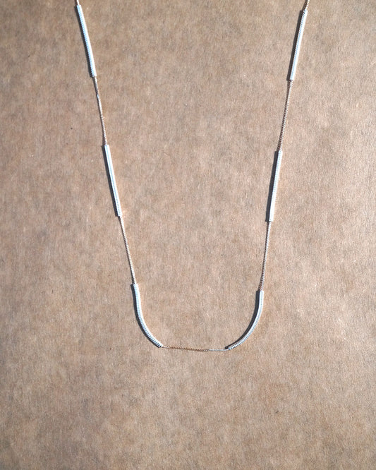 snake bene necklace